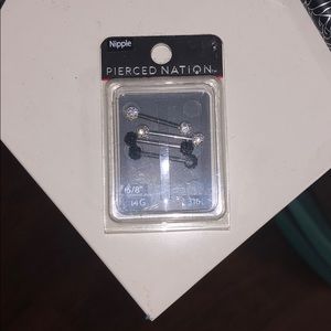 Spencer’s nipple piercings